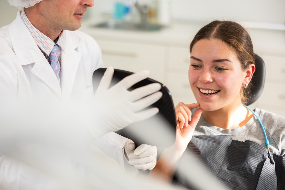 Consultation in a modern dental office discussing sedation and anesthesia options.