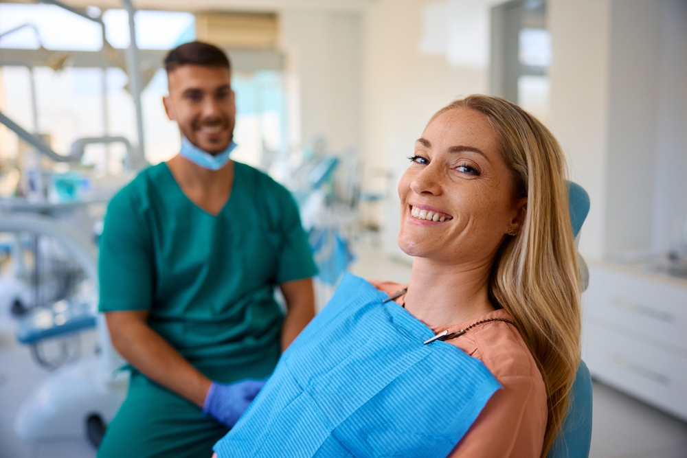 Dentist discussing removable bridge options with a patient